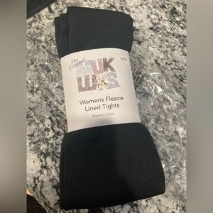 BRAND NEW woman’s fleeced tights size large